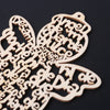 A set of twelve wooden angel ornaments cut from light wood with intricate designs.