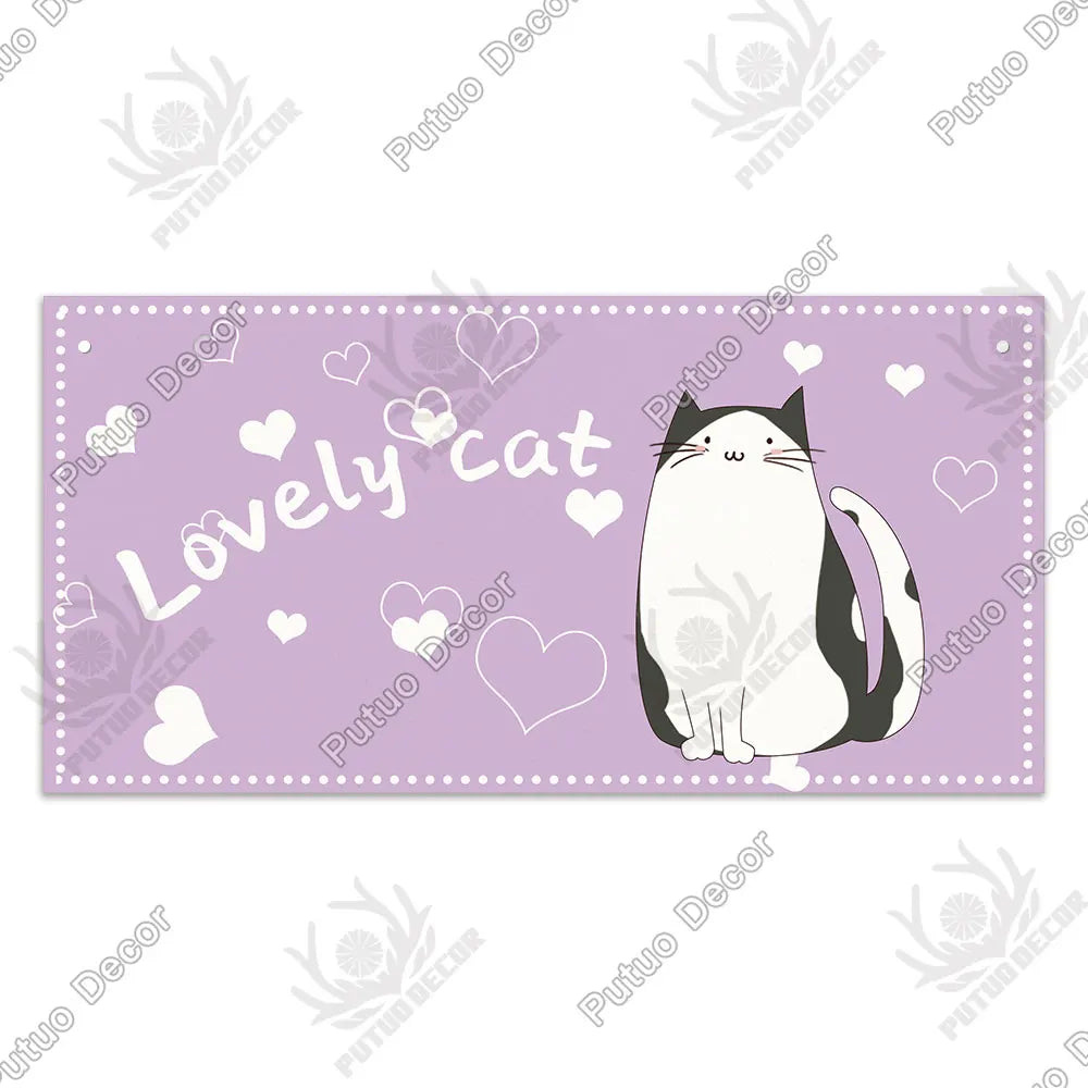 A purple rectangular wall plaque featuring a cute black and white cat illustration and the text Lovely Cat.