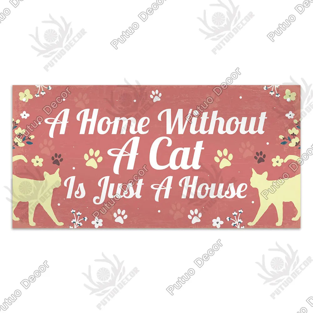 A rustic wooden wall plaque featuring a cat silhouette on a pink background with text that reads A Home Without A Cat Is Just