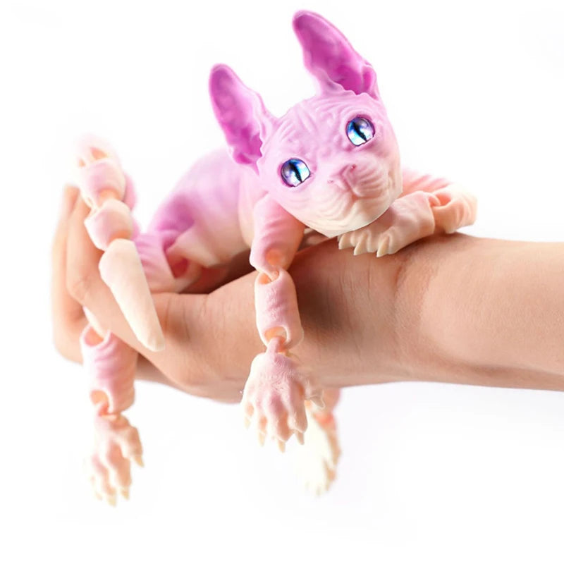 A pink realistic 3D printed Sphynx cat figurine fidget toy is held in a person's hand.