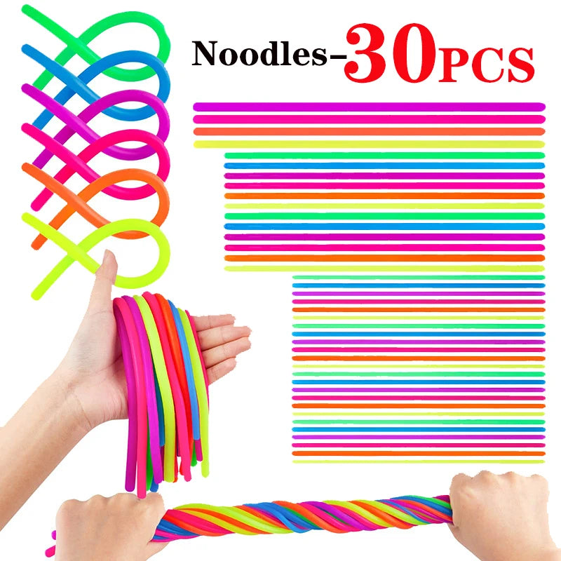 A hand is stretching a colorful noodle fidget toy, showing various bright colors like pink, green, and blue.