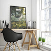 A canvas print featuring Frank Ocean album art displayed on a wooden desk next to a black chair and books.