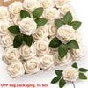 A tray of creamy white foam rose flowers with green leaves for DIY bouquets and home decor