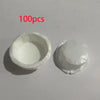 A set of 100 white fluted paper cups for baking and party decor.