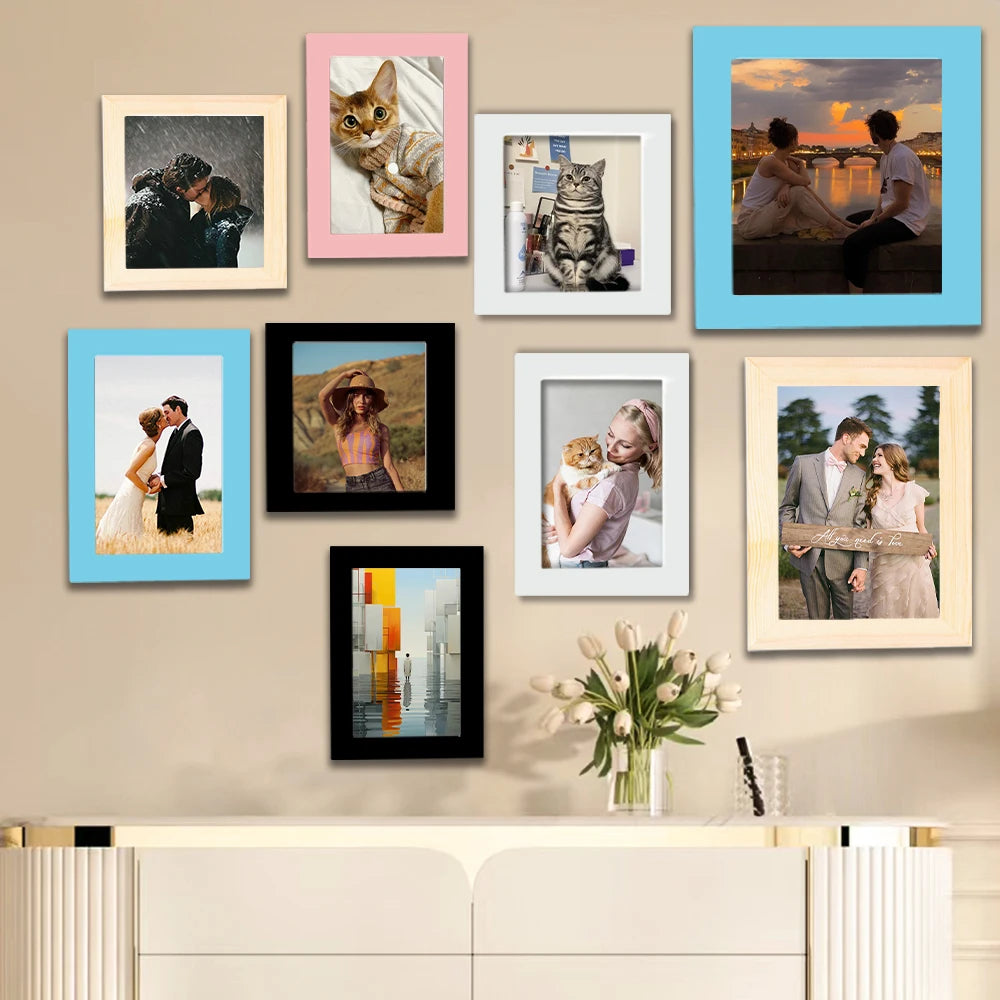 A collection of framed photographs featuring pets and couples displayed on a beige wall.