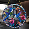 Colorful acrylic hummingbird suncatcher hanging ornament featuring iridescent blue and purple birds surrounded by floral elem