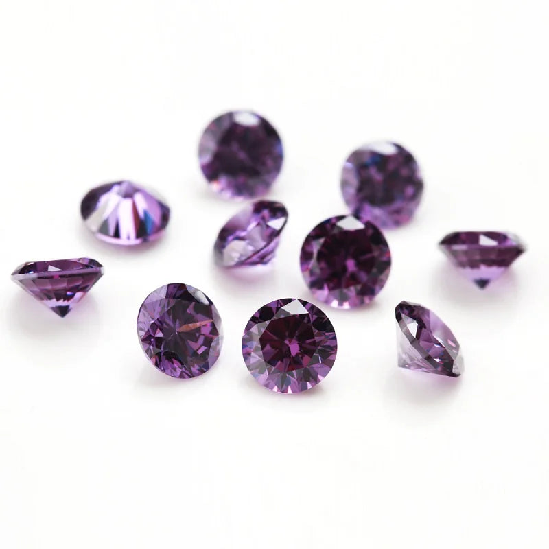 A collection of round cut purple cubic zirconia loose stones for jewelry making.