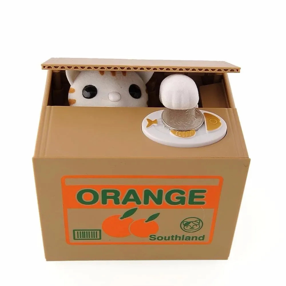 A cardboard box containing an interactive coin bank with a white animal design and an orange label.