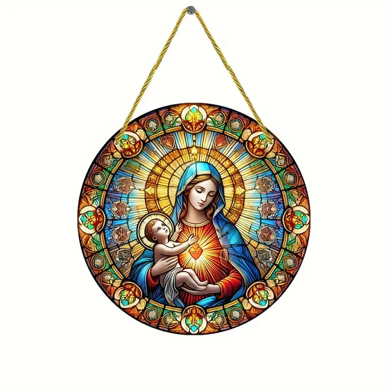 A translucent acrylic Mary Suncatcher featuring the Virgin Mary and the infant Jesus surrounded by a radiant sun design.