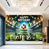 A football-themed birthday backdrop banner featuring a cake, trophies, crowns, and soccer balls on a green field.