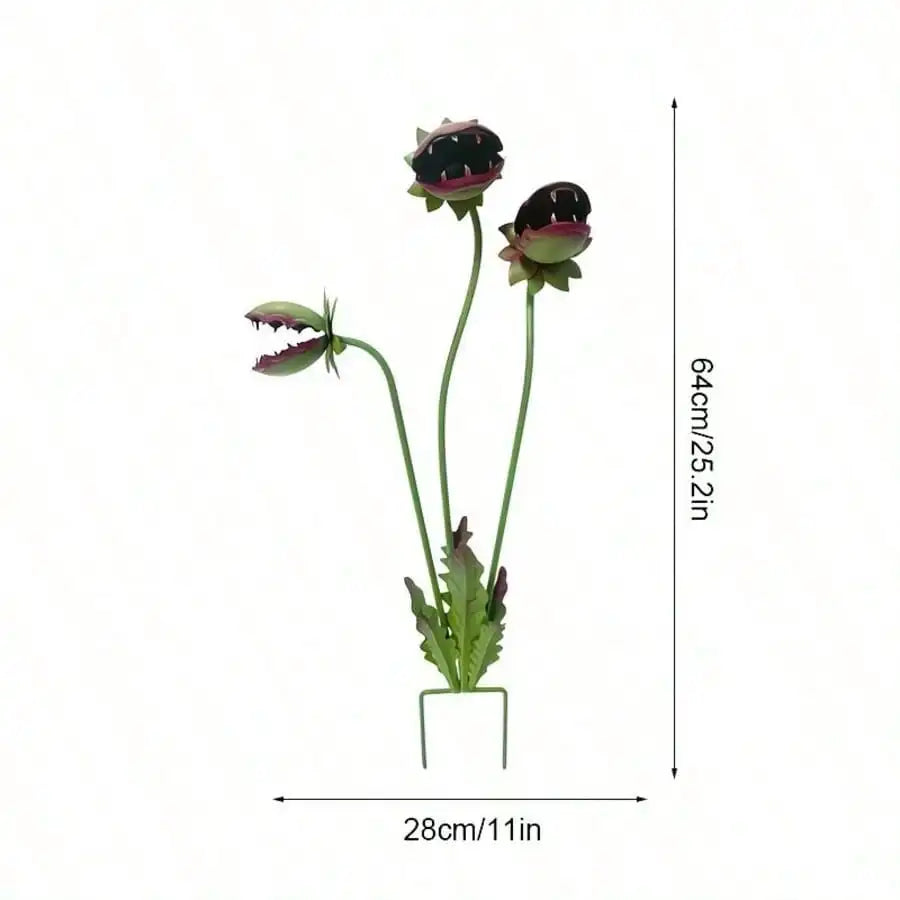 A decorative metal carnivorous flower garden stake with three flower heads, shown vertically.
