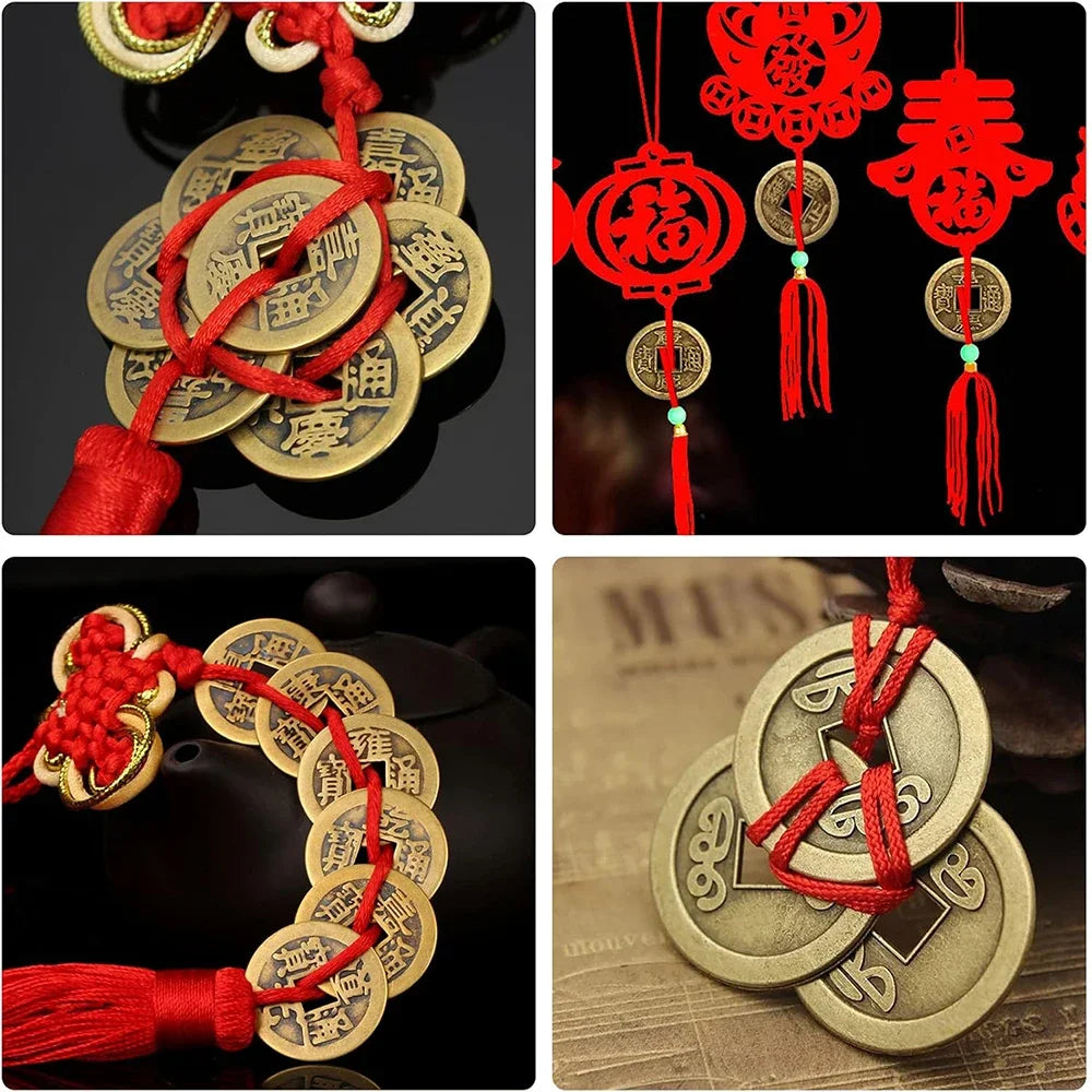 Antique Chinese Feng Shui coins for wealth and good fortune displayed on red silk threads.