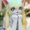 A cute, light green and yellow furry cosplay head with large eyes and long hair.