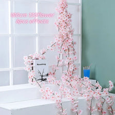 A long pink sakura flower garland with 8 pieces is displayed against a white background.