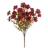A sprig of artificial fall floral decor featuring deep red and orange-brown leaves and small flowers on a thin stem.