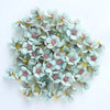 A cluster of light blue and pink silk artificial flower heads used for weddings, crafts, and home decor.