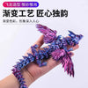 A hand holds a purple and blue dragon fidget figurine with iridescent gradient printing.
