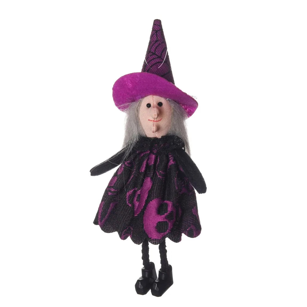A small ornament featuring a witch hat, gray hair, and a purple dress with black accents.