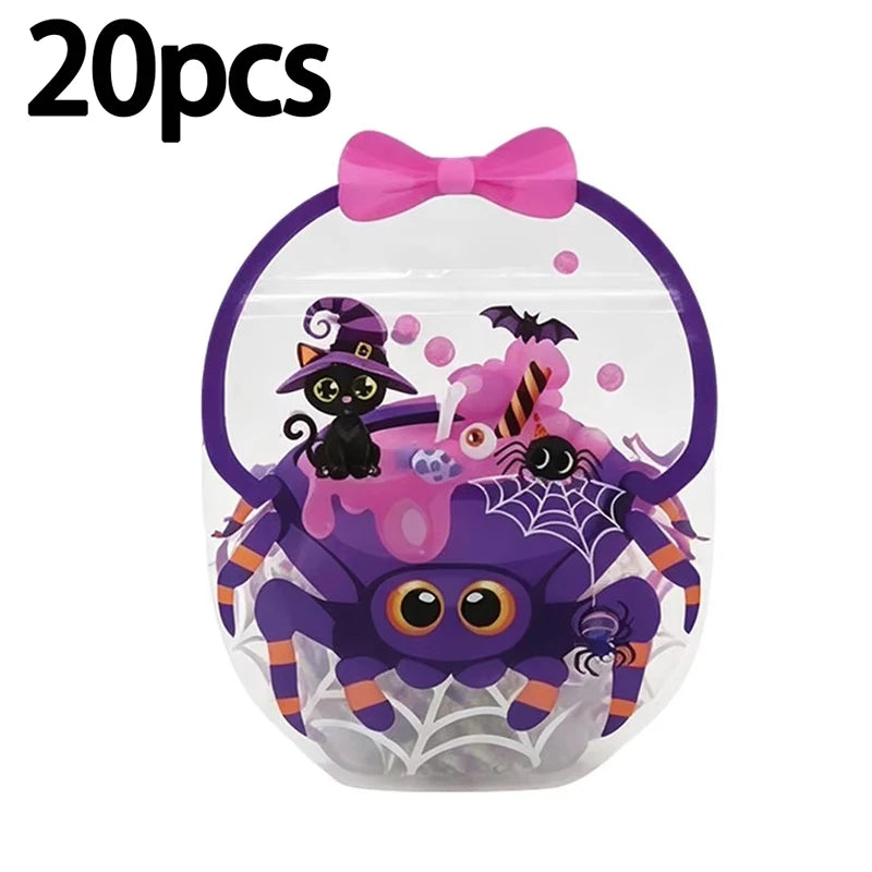A purple Halloween pumpkin witch treat bag featuring a black cat and a pink witch character with a bow.