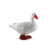 A white ceramic figurine of a goose with an orange beak and red feet.