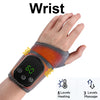 A black wrist device with orange accents is shown on a hand, designed for heating and massage.
