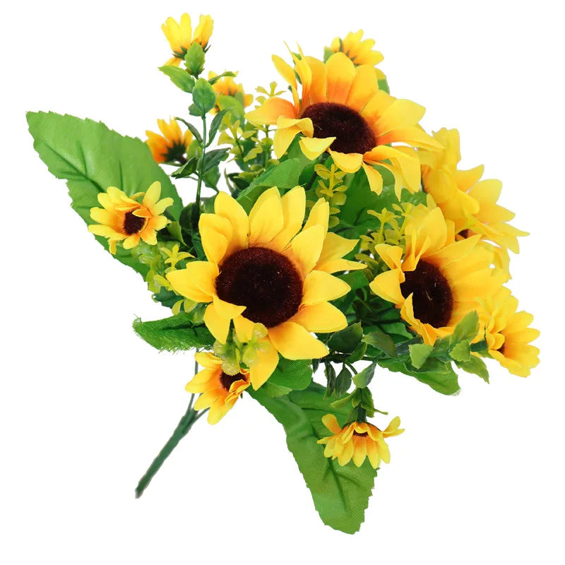 A bouquet of bright yellow artificial sunflowers with green leaves and stems.