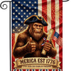 A flag featuring a depiction of a brown gorilla wearing a hat and holding a rolled document against an American flag backgrou