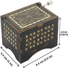 Antique wood music box with engraved melody featuring intricate patterns on the lid and body.