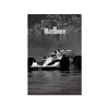 Black and white photo of a Marlboro racing car on a wet track.