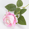 Pink and white velvet artificial roses with bendable stems on a green leaf stem