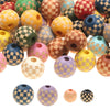 A collection of natural wooden checkered beads in various colors including yellow, green, brown, and purple.