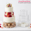 A three-tiered acrylic cake stand displaying macarons and teddy bears for dessert presentation.
