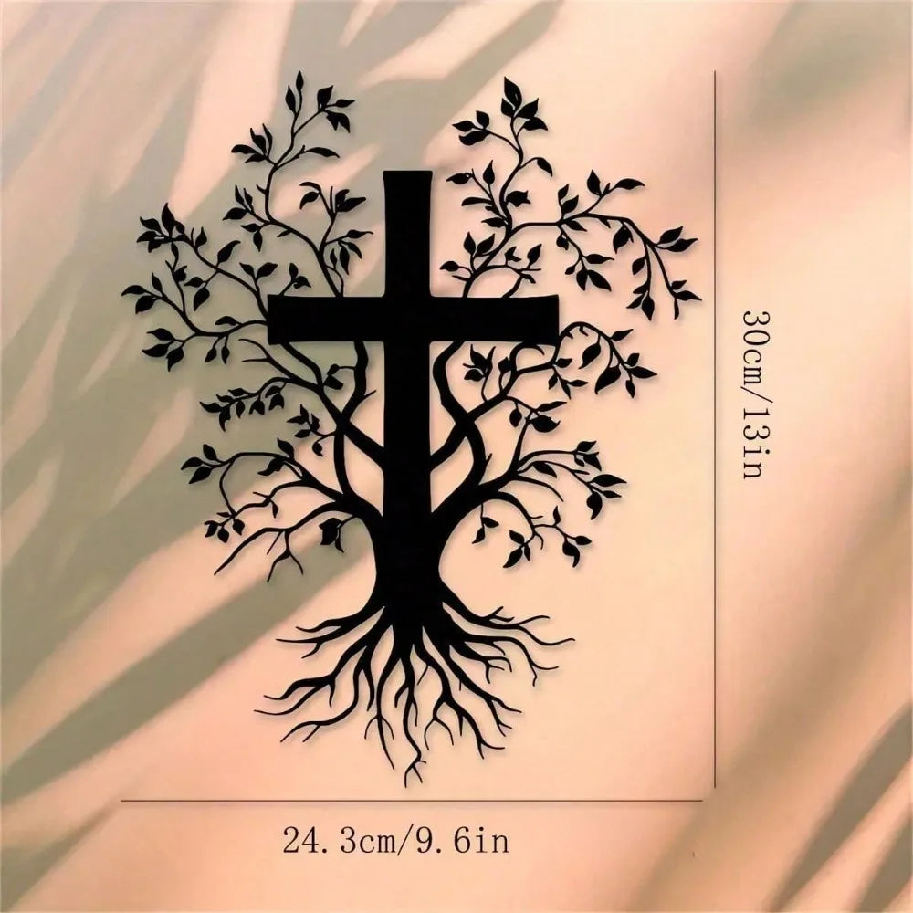 Black silhouette of a tree with roots and a cross carved into a light wall.