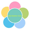 A colorful arrangement of pink, yellow, green, and blue circles representing pom poms.