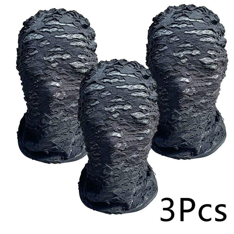 Three black mesh balaclava face masks shown from the top view.