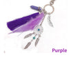 Bohemian dream catcher keychain featuring a purple feather tassel and silver accents.