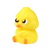 A bright yellow silicone duck or chick figurine.