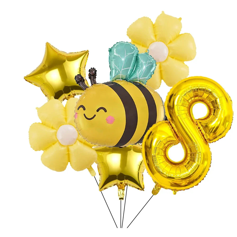 A set of six yellow and gold aluminum foil daisy balloons shaped like bees and numbers for parties