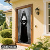 A vertical door banner featuring a black-robed nun with a mask and crucifix, displayed in a wooden frame on an exterior wall.