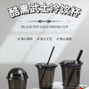 Three black disposable U-shaped drink cups are displayed on a white surface.