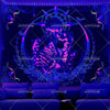 A dark blue tapestry featuring a glowing purple lotus design with intricate geometric patterns and celestial elements.