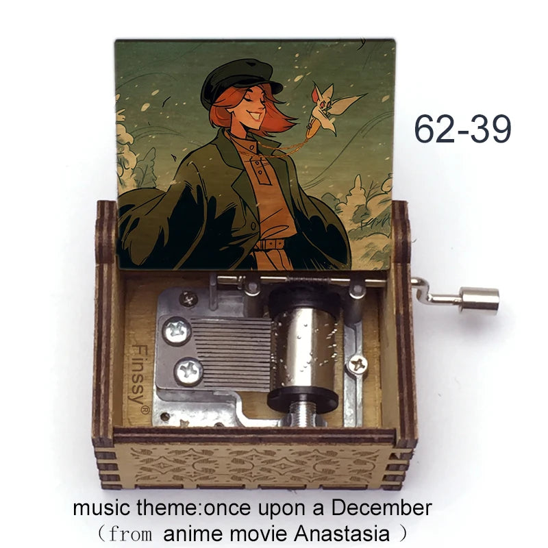 A hand-cranked wooden music box featuring an illustration from the anime movie Anastasia