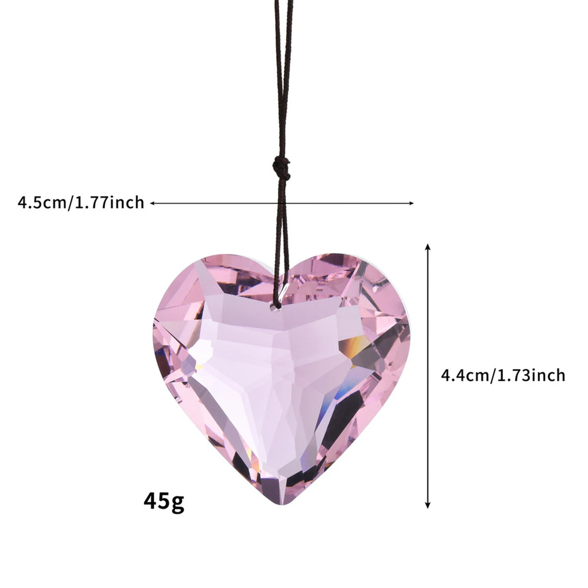 Pink heart-shaped window pendant with a black cord and measurements.