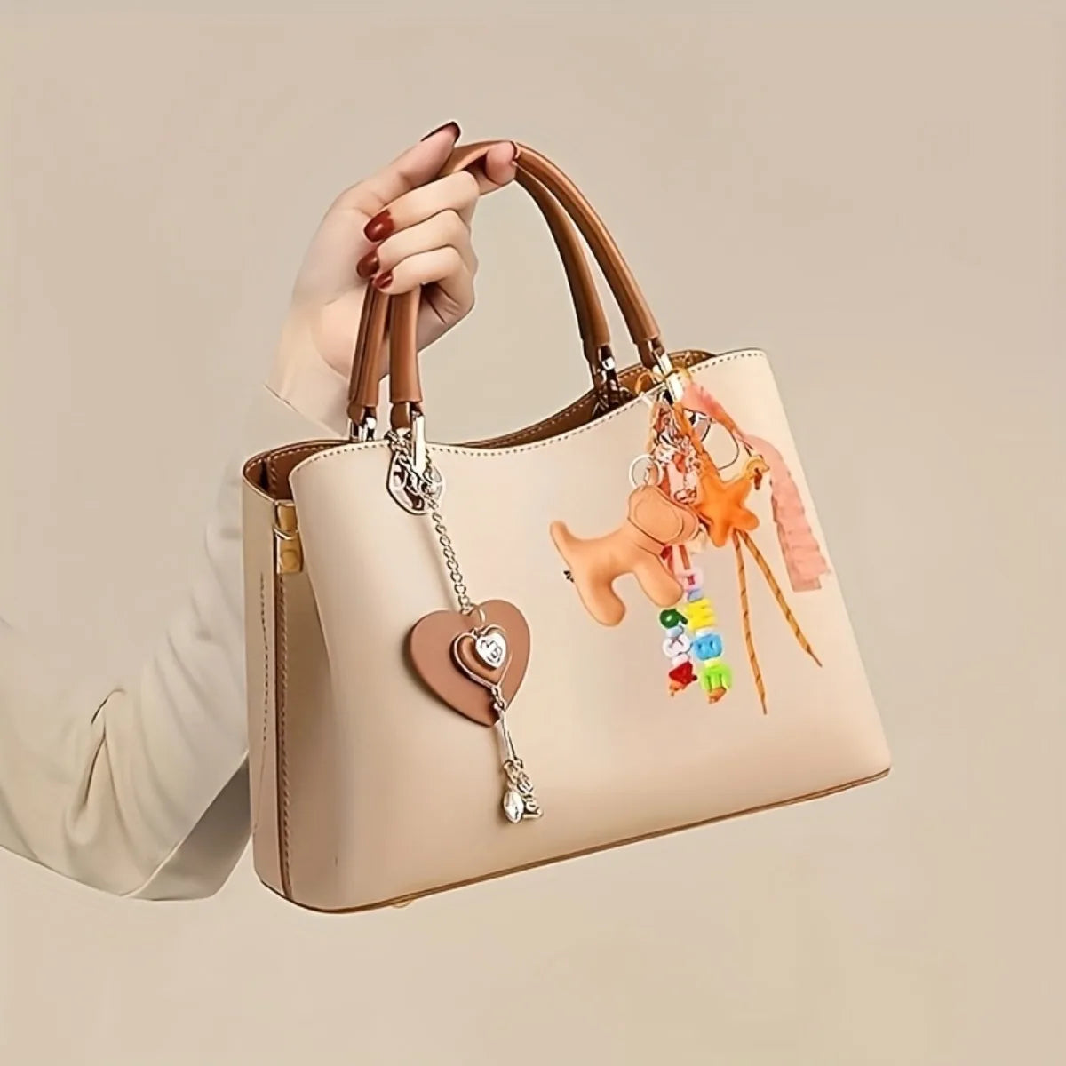 A hand holds a beige nylon rope DIY craft kit bag with leather handles and colorful charms.