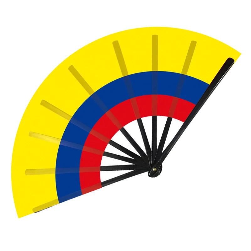 A folding cheering fan with yellow, blue, and red stripes resembling South American flags.