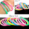 A collection of 10 silicone bracelets with a Jesus heart design in various bright colors.