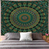 Bohemian mandala tapestry wall art featuring intricate floral patterns in teal, green, and black on a dark background.