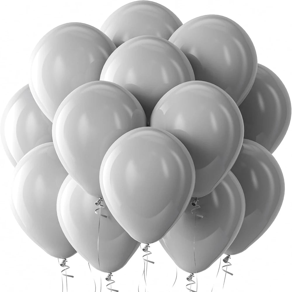 A cluster of white latex balloons floating against a white background.