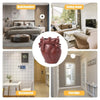 Heart-shaped resin pen organizer displayed in various room settings including a bedroom, living room, restaurant, and corrido