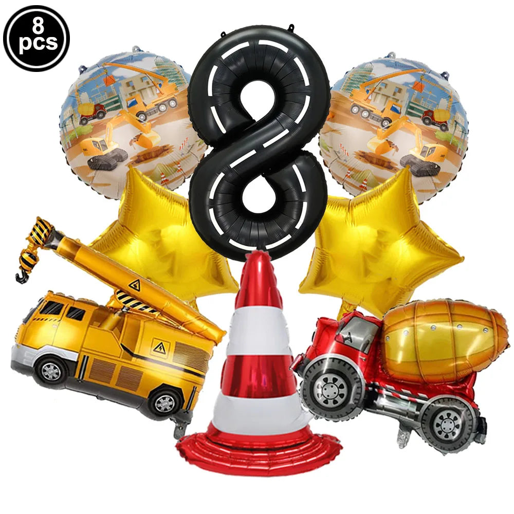 Eight construction truck foil balloons and a traffic cone for birthday party decor